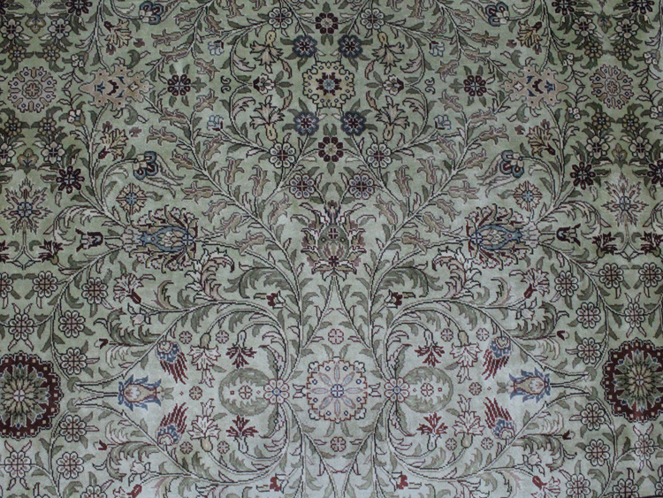 the field of persian hand-made silk rug