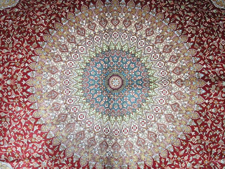 origold and blue central medallion of oriental silk carpet