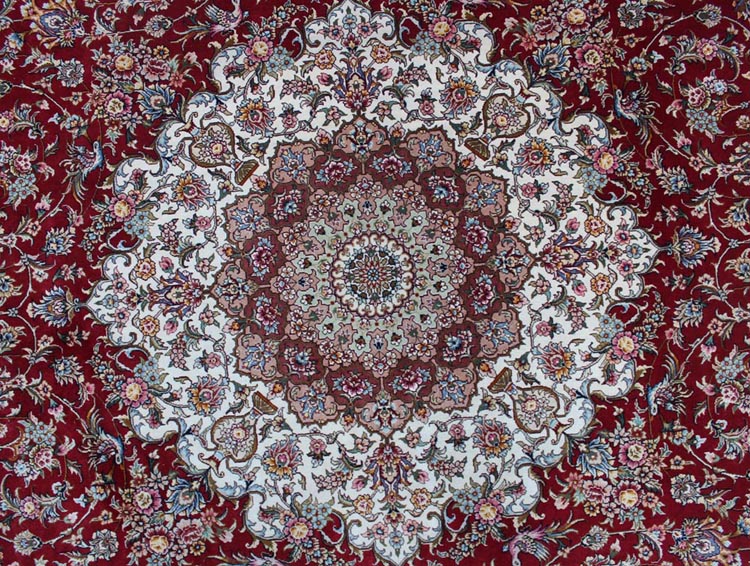 origold and blue central medallion of oriental silk carpet