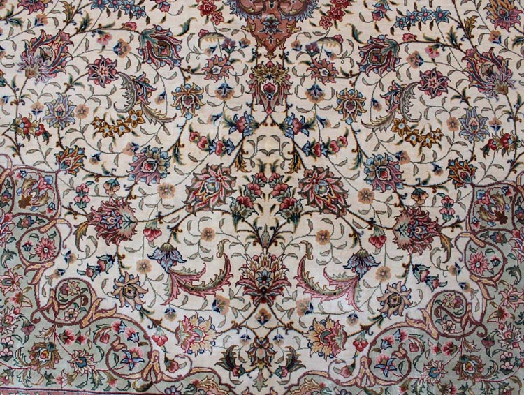 the field of oriental hand-made silk rug