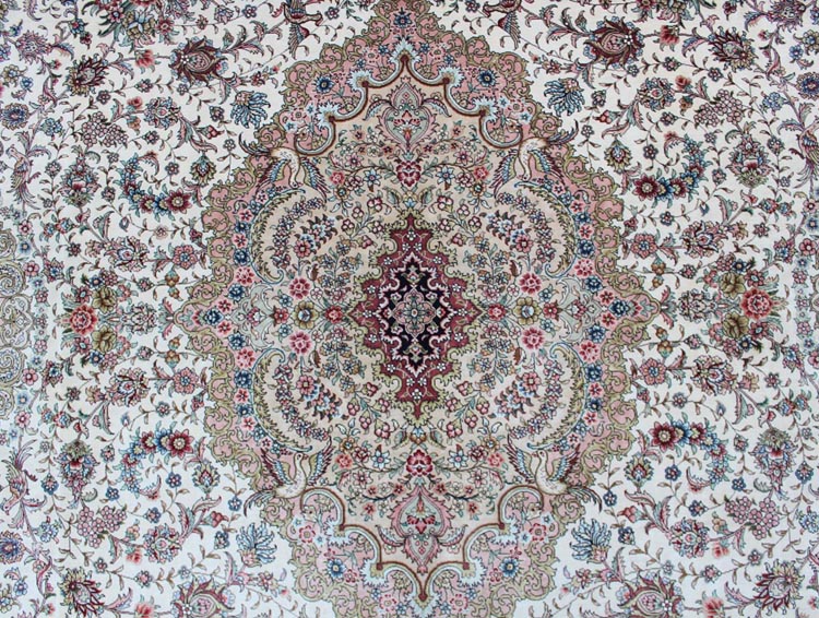 diamond shape medallion on persian silk rug